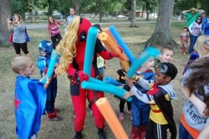 Kids battle villains at the Kids in Capes! Superhero Walk/Run