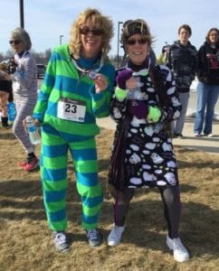 Friends showing off their pajamas at the PJ 5K/10K.
